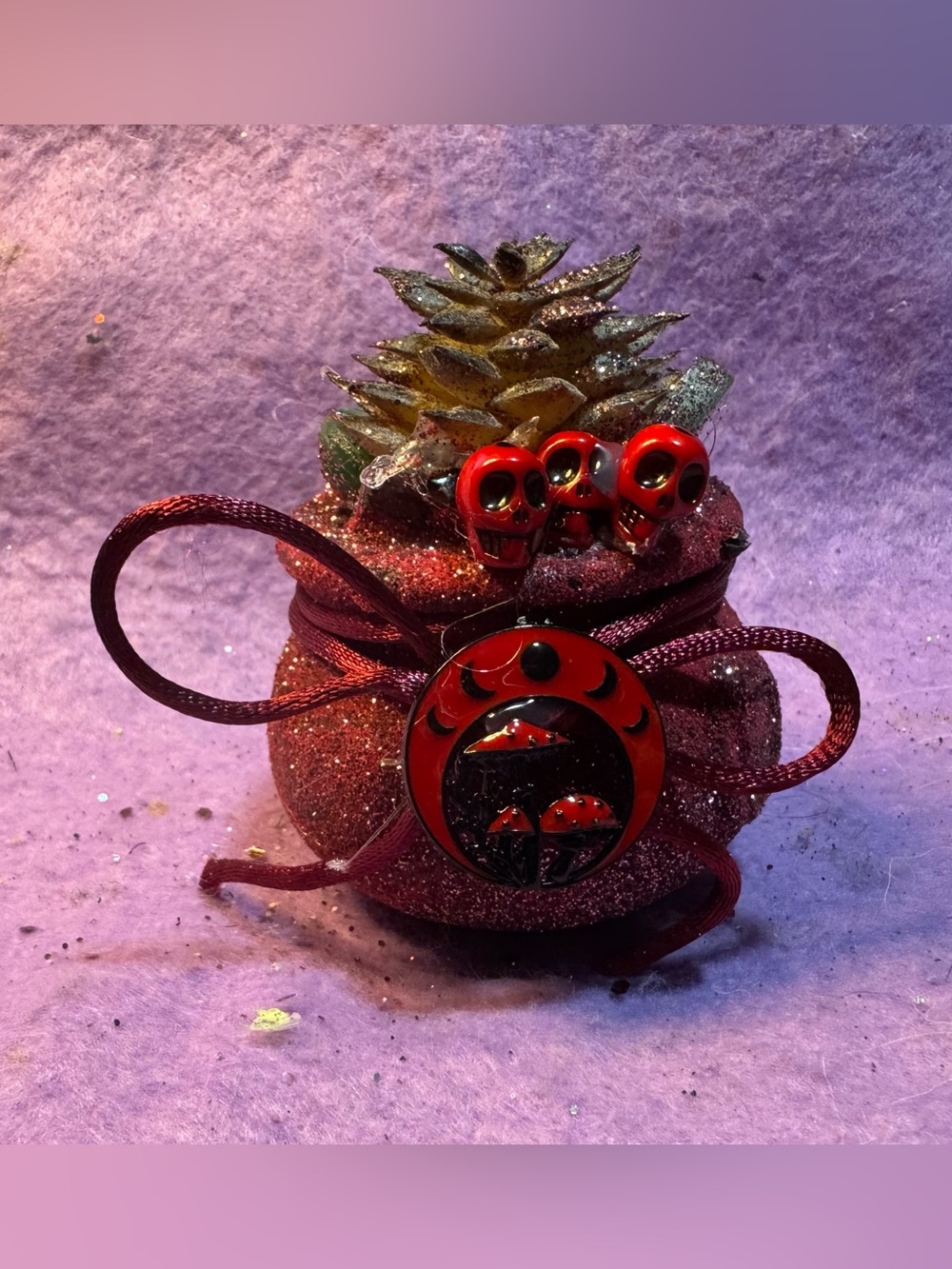 Red mini cauldron faux succulent with red and black mushroom charm